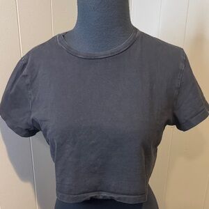 B8.  Princess Poly black 100% cotton crew neck short sleeve cropped T shirt.